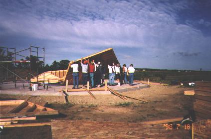 Raising the pentagon panels.